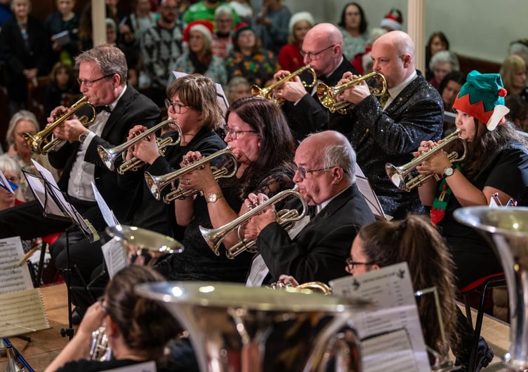 Members of the band conducted by Alister Berry. Picture: Paul Williams.