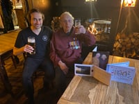 Drink with his grandson gave Ed a perfect 100th birthday