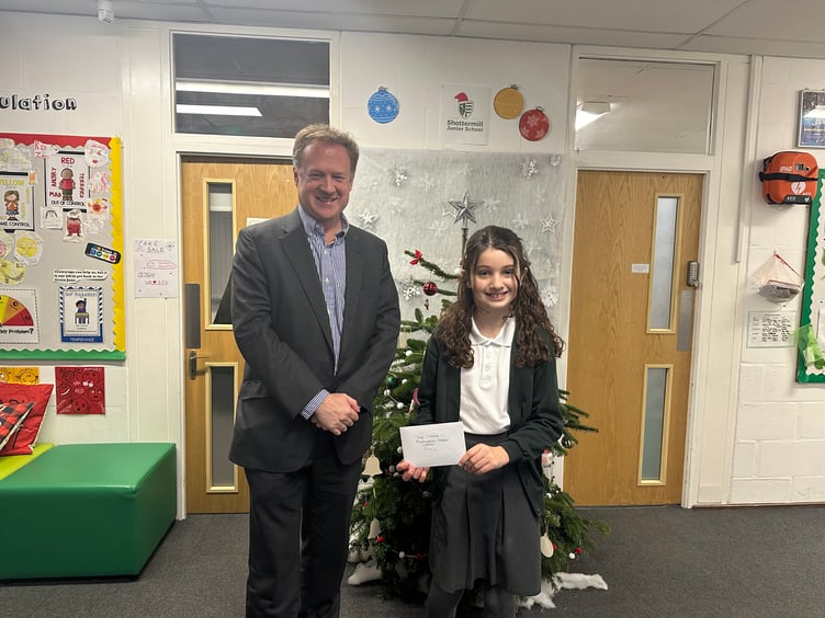 All smiles for the winner of Mp Greg Stafford's very first Christmas competition