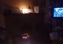 Television by candlelight as Selborne residents tackle power cut