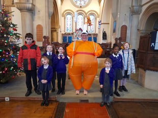 Mrs Christingle brings festive message to William Cobbett pupils