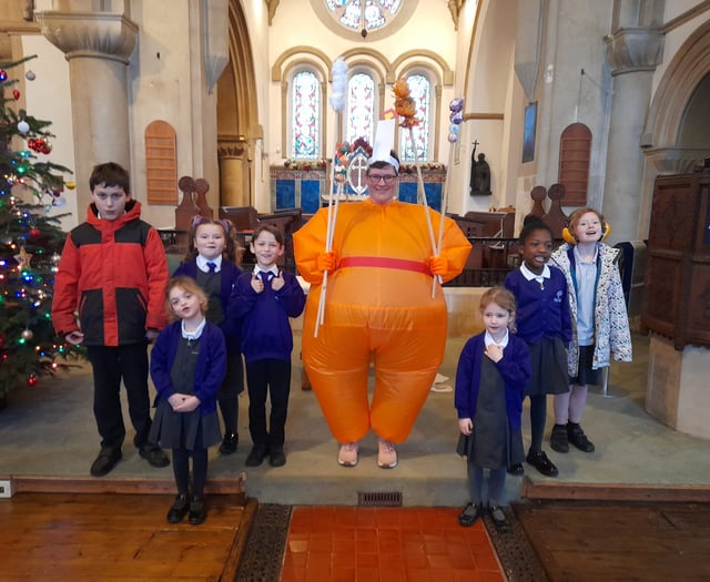Mrs Christingle brings festive message to William Cobbett pupils