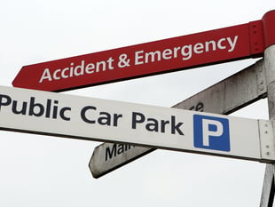 The Royal Surrey County Hospital makes more than £1 million in car parking charges