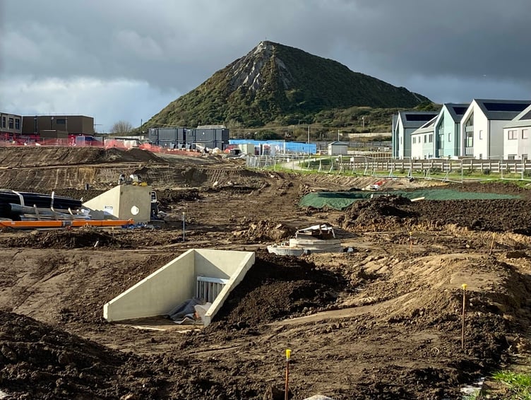 The Sky Tip looms above the continuing development of the first phase of the garden village. Picture: Andrew Townsend
