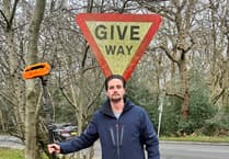 The Sign Guy gives back to the community by cleaning Farnham's road signs