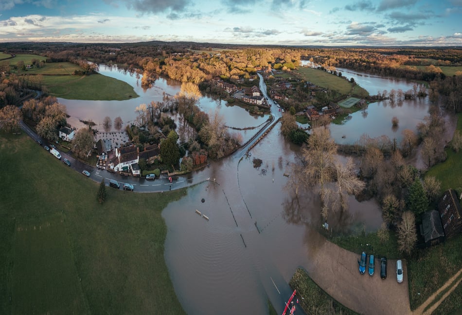 <p>Michael Hoblyn took this picture of the flooded River Wey dividing Tilford in January 2025.</p>