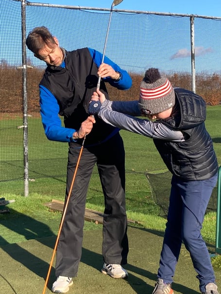 Petersfield Golf Club professional Donovan Hall with a pupil at Petersfield Golf Club