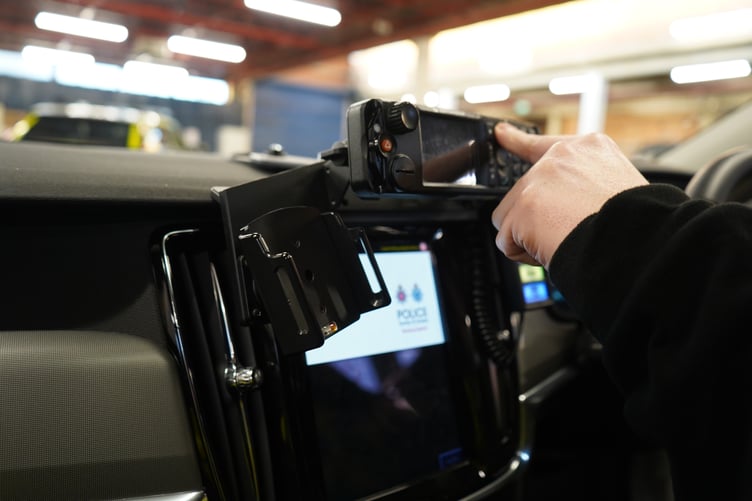 Surrey Police setting up gear ready for a shift