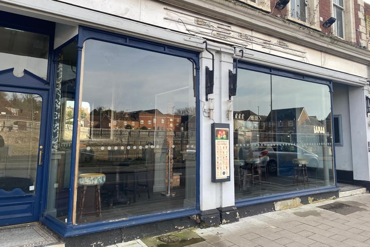 Signs at the former Slug and Lettuce nightspot on East Street, Farnham have been taken down this week.