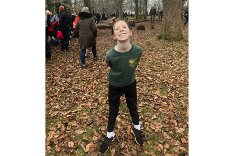 All smiles from this Trewidland Primary School runner