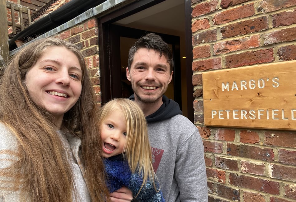 <p>Margo with parents Jasmine and Barnaby (Jasmine Kerr)</p>