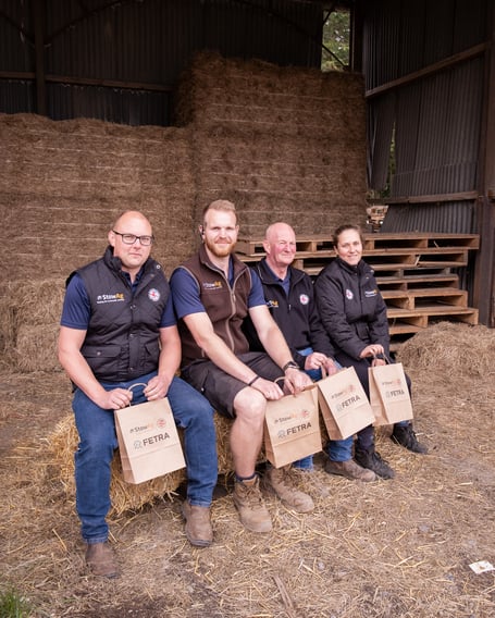 From left: Alton StowAg staff Karlos James, Alex Holton, Nick Lucas and Lara Haskins with goody bags, December 2024.