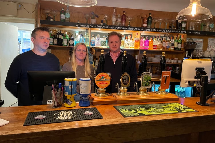 Robin and Lucy Catchpole, owners of the Bluebell Inn in Docklefield, with Farnham and Bordon MP Greg Stafford.