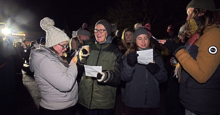 Singing traditional wassail songs in the orchards of Sheppy's Cider for this year's wassail. PHOTO: Alain Lockyer.