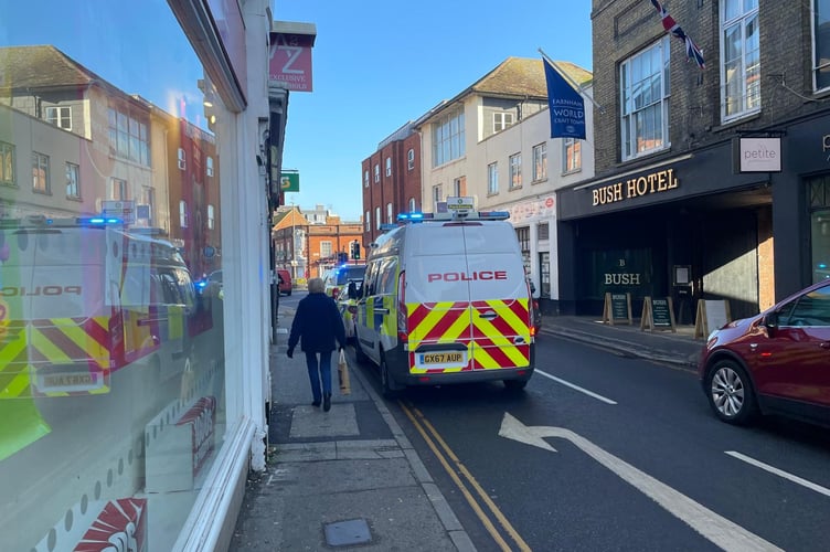 Police respond to the incident at Santander bank in The Borough, Farnham.