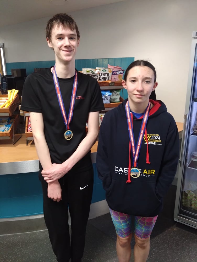 Rowan and Abi with their medals