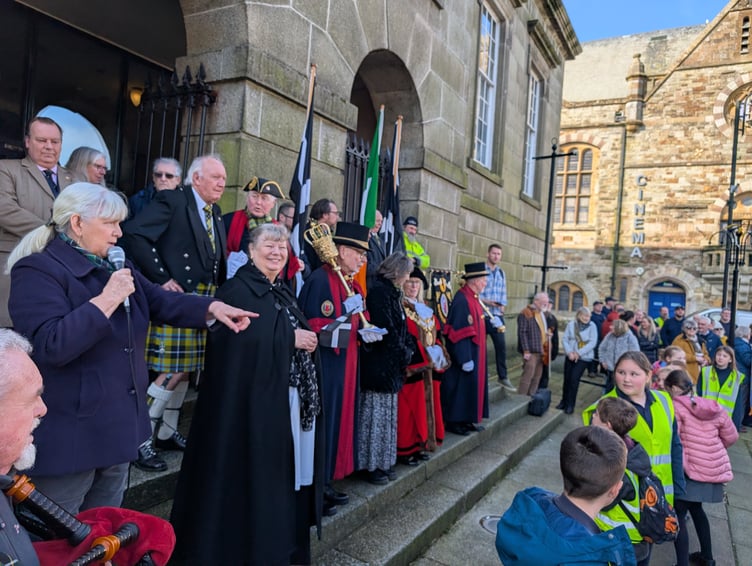 Smiles on the faces of the mayoral party as they enjoy the performance from the school children (Picture: Aaron Greenaway)