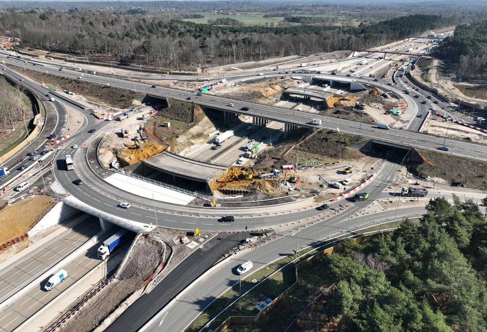 <p>An aerial view of the new gyratory at M25 J10. The bridge that will be demolished this weekend can be seen in the background, with the bridge that will be demolished in two weeks' time in the foreground.</p>