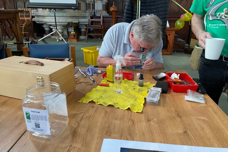An expert hard at work at Farnham Repair Cafe on Saturday, March 8, 2025.