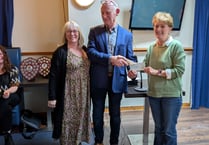 Community groups celebrate donations from proceeds of firework night