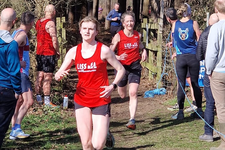 Leoni Barber and Naomi Ward approach the finish line