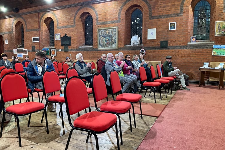 The audience at St Mark's Church watching the Farnham Poetry Competition prize-giving event.