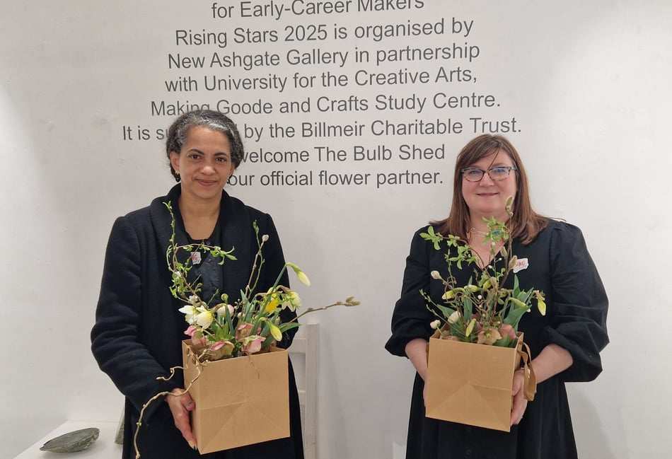 <p>Flowers for winner Makila Nsika and runner-up Zillah Puri (Photo: Outi Remes)</p>
