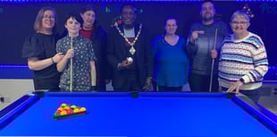 Glory baize as pool table unveiled at community centre