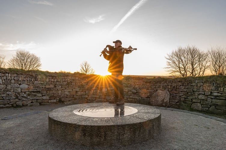 Kerdroya founder Will Coleman piping at sunrise on the spring solstice