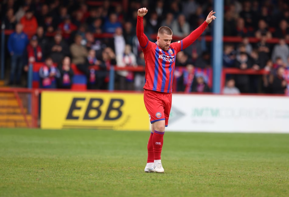 <p>Josh Barrett celebrates after scoring Aldershot's second goal (Photo: Ian Morsman)</p>
