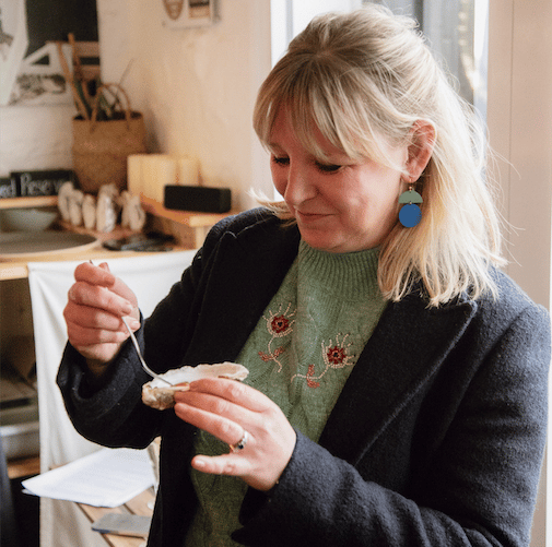 There seems to be a knack to eating oysters which were dished up for the launch of the 2025 edition of Eat Exmoor. PHOTO: Daffodil PR.