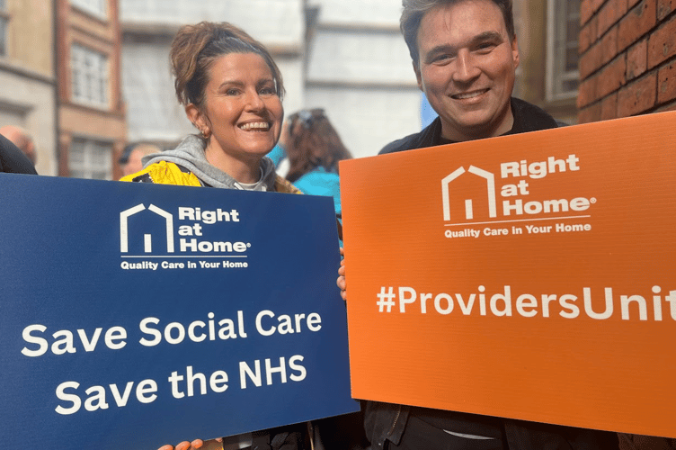 Right at Home GF marketing and recruitment manager Liz Young and head of finance and business development Rhys Bailey on social care reform protest march, Westminster, March 2025.