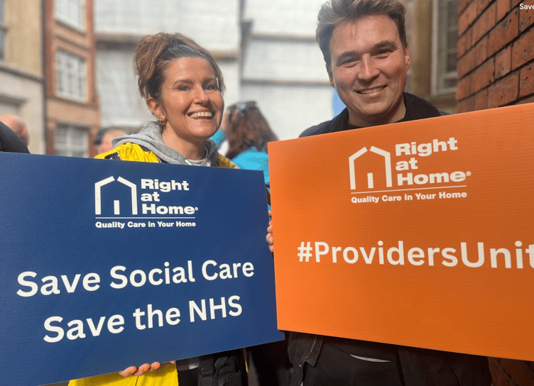 Right at Home GF marketing and recruitment manager Liz Young and head of finance and business development Rhys Bailey on social care reform protest march, Westminster, March 2025.