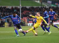 Shots fall to heavy defeat as unbeaten run ends