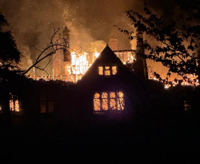 WATCH: Historic house severely damaged in late-night blaze