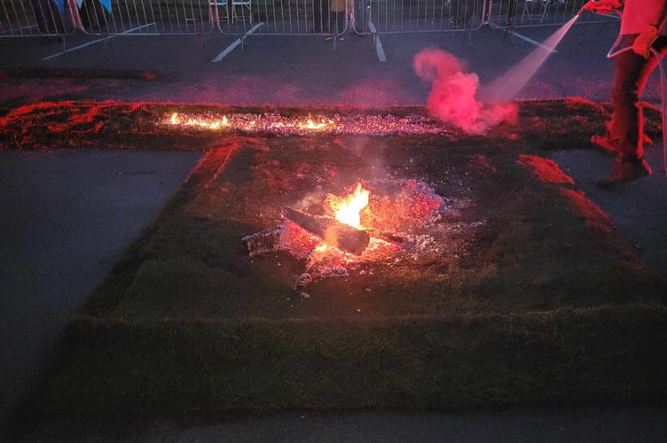 The fire was gradually broken down and then the embers were spread over the turf and made ready for the challenge. FitzRoy firewalk 2025.