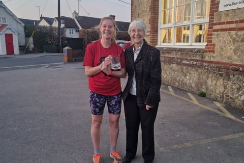 Ladies' champion Georgie Freeman receives her award from Margaret Stothard