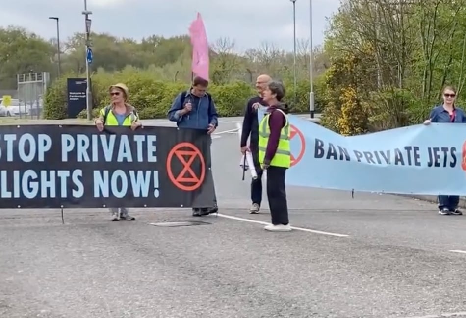 <p>Protestors recently blockaded an entrance to Farnborough Airport in opposition to expansion plans</p>
