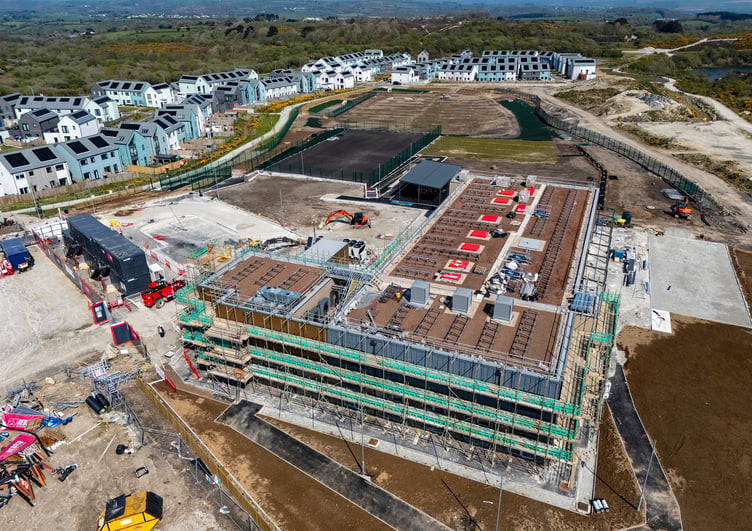 The new school is being provided along with a play area and a sports pitch. Picture: Paul Williams