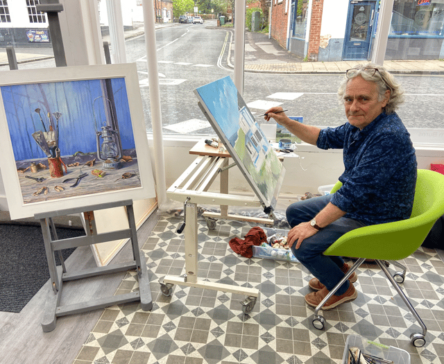 Coastal scene under creation by Tim Burns' paintbrush in Alton gallery