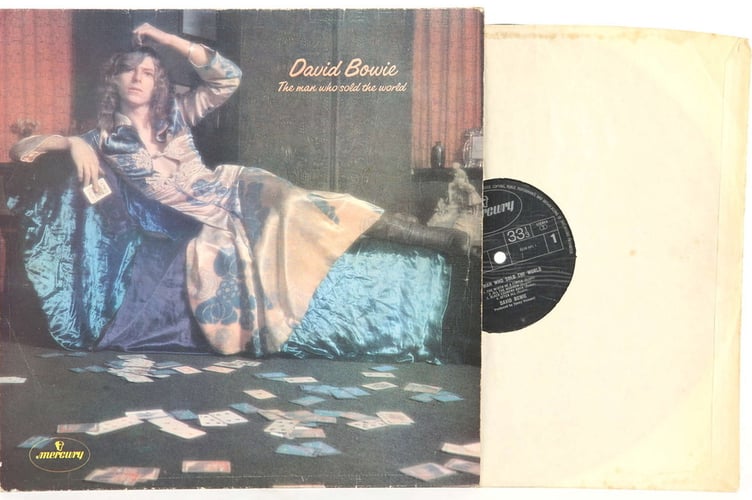 The Man Who Sold the World, by David Bowie, with the rare, misprinted label  £300-500.  Photo released April 10 2025. Britain's largest private record collection described as "Aladdins Cave of music" is set to sell for close to £100,000 at auction - it includes a rare classic David Bowie album and whole discographies of iconic British bands.The staggering collection which contains over 30,000 pieces that track back over 60 years will be sold at Ewbanks Auction house in Woking, Surrey.The LPs that filled the owners house before they passed away include a host of rarities all found in superb condition.John Silkewho is tasked with organising the mountain of spinning discs said he has "never seen anything like it".