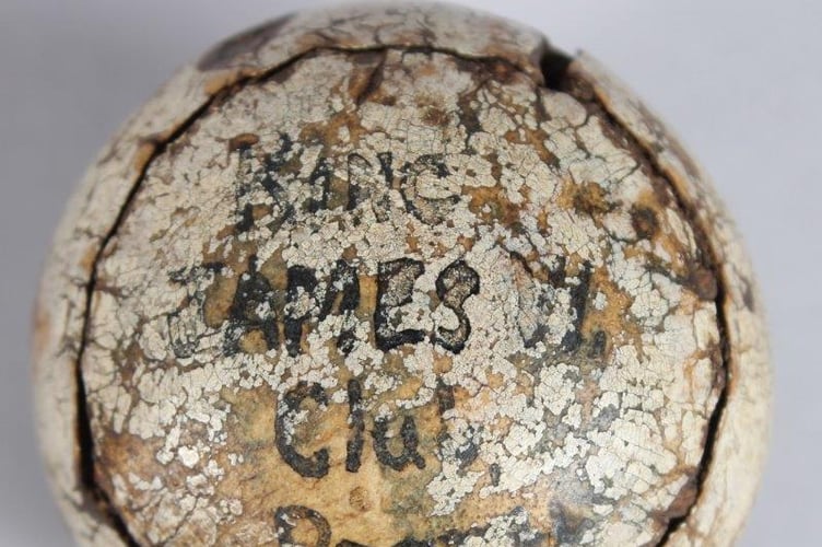 An old leather-bound featherie golf ball due to go under the hammer has presented a conundrum for auctioneers - and it is set to fetch up to £10k. Photo released April 27 2025. The early leather-bound feather golf ball was consigned for sale from a house move in Old Woking in Surrey and John Nicholsons auctioneers will sell it on May 14. The auctioneers said the family heirloom is inscribed stamped King James VI Club. Perth to one side, and 1807 Martins?? 1807 to the other  the inscriptions appearing under much wear and tear to the ball.