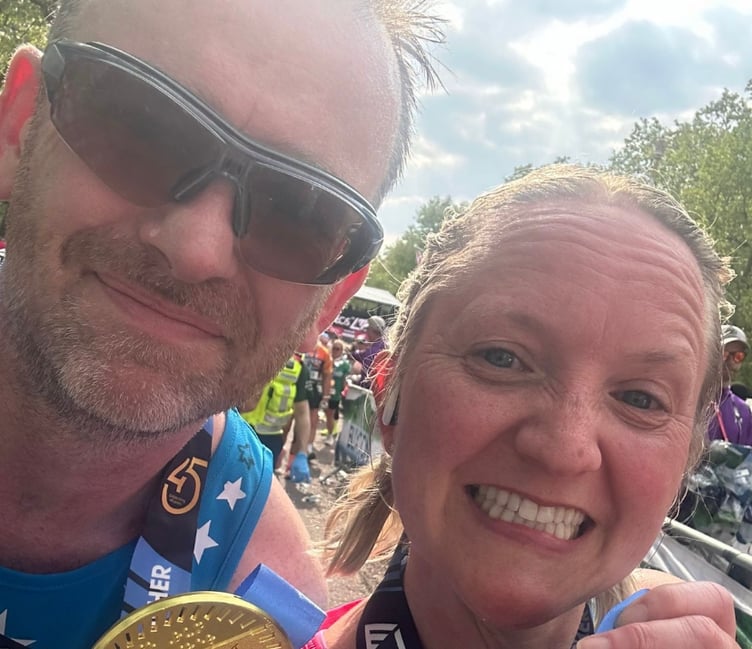 Toby Jennings and Louise Way look ecstatic after their marathon efforts for Phyllis Tuckwell charity.