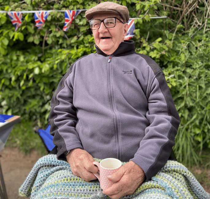 Ninety-seven-year-old Edgar Webber was a special guest as Cutcombe residents held a street party for VE Day 80. PHOTO: Leanna Coles.