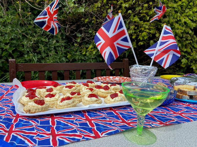 Cream teas were enjoyed by Cutcombe residents who held a street party for the 80th anniversary of VE Day. PHOTO: Leanna Coles.