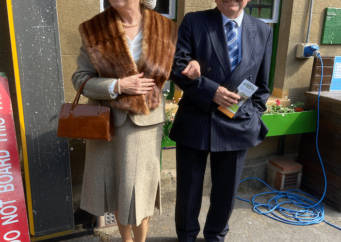 Couple in 1945 clothes, Alresford station, May 8th 2025.