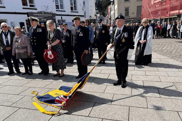 Members of the public and local figures reflected with a two minute silence