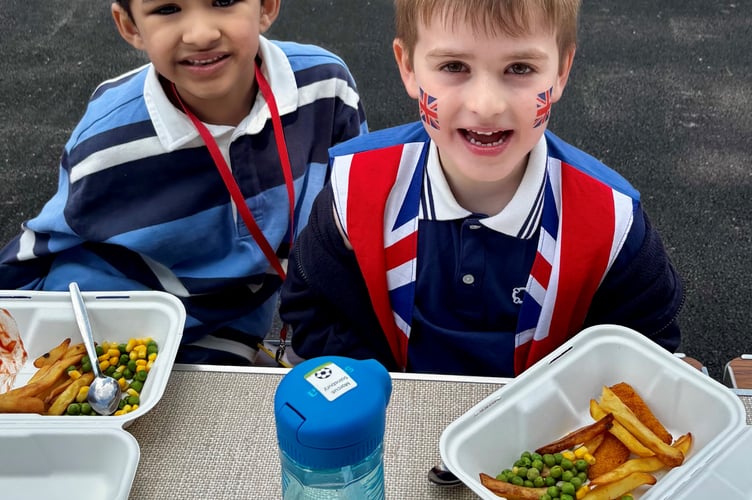 Young lads get into the VE Day spirit at St Mary's CofE Primary School in Frensham