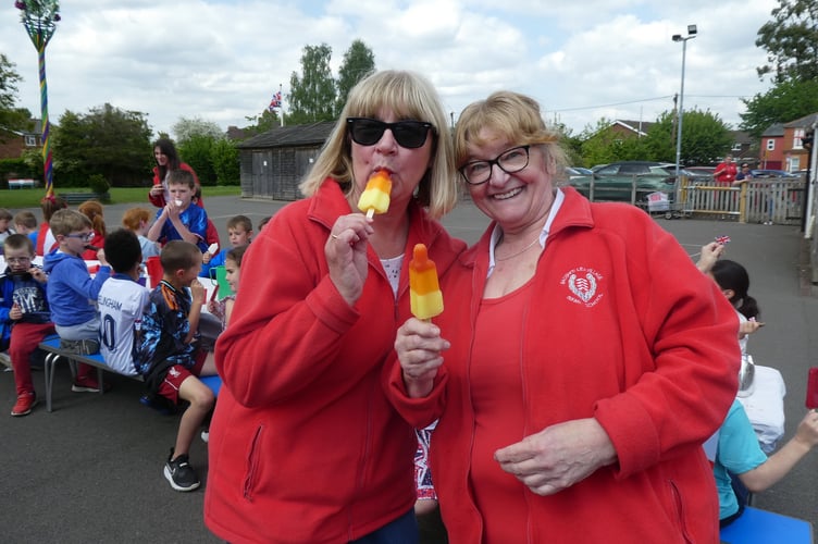 Teachers having an n-ice time at Badshot Lea Village Infant School's VE Day 80 party.