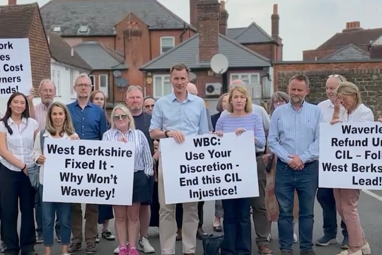 Jeremy Hunt MP leads protesters against Waverley's CIL charges.